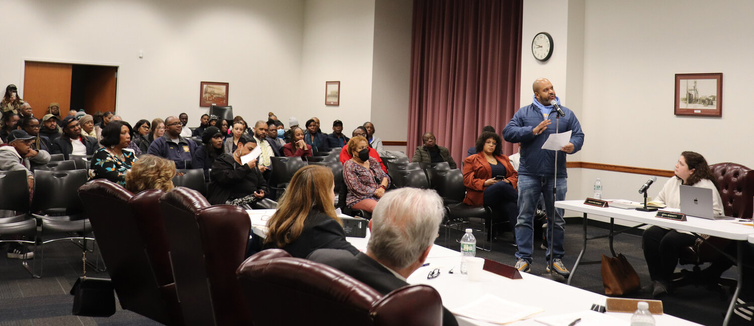 Forty local residents expressed their outrage with the Elmont Memorial Library board’s decision to discontinue early voting at its meeting on Jan. 25. Sheldon Miekle asking the board to revisit its decision before the November general election.