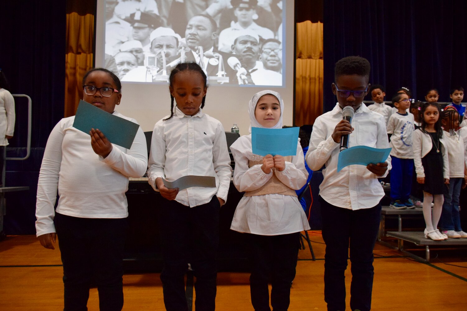 Students at Alden Terrace School in Elmont pay tribute to Martin Luther King Jr. during an assembly through song, poetry and presentations on Jan. 12.