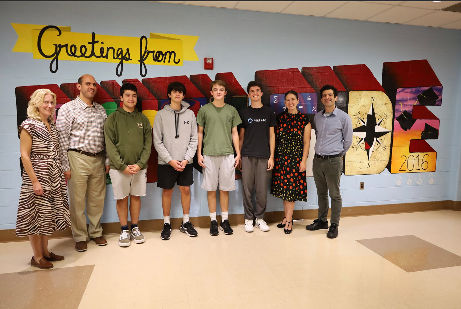 South Side High School music teacher Doreen Fryling, left, with band instructor Anthony Pomponio and All-State Conference seniors Paul Adal, Paul Marquardt, Owen Cashman, James Giangregorio, along with music teachers Katie Mark and Barry LeBron.