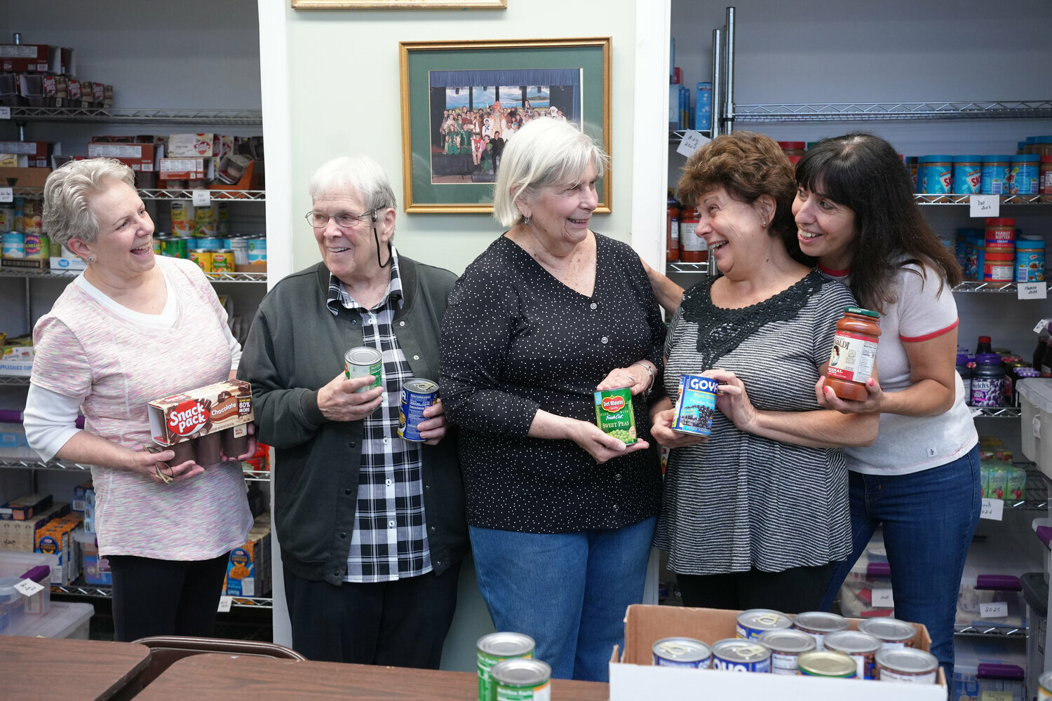 The Community Chest is key to countless community resources — like the food drive run by Our Lady of Peace social ministry.