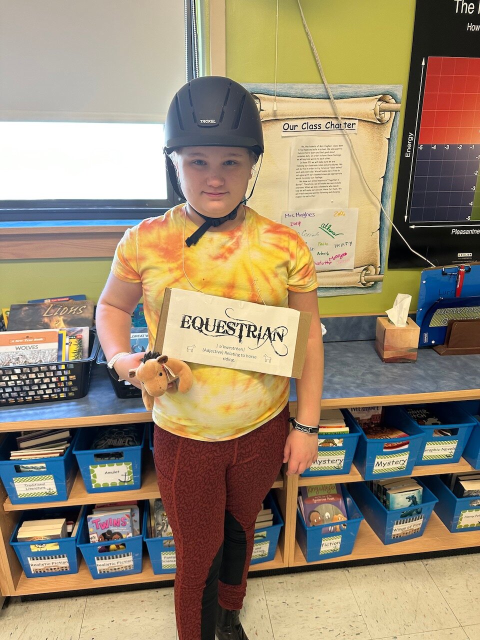 Fourth grader Zelda from Centre Avenue School showing off the word Equestrian during “Dress Like a Word Day.”