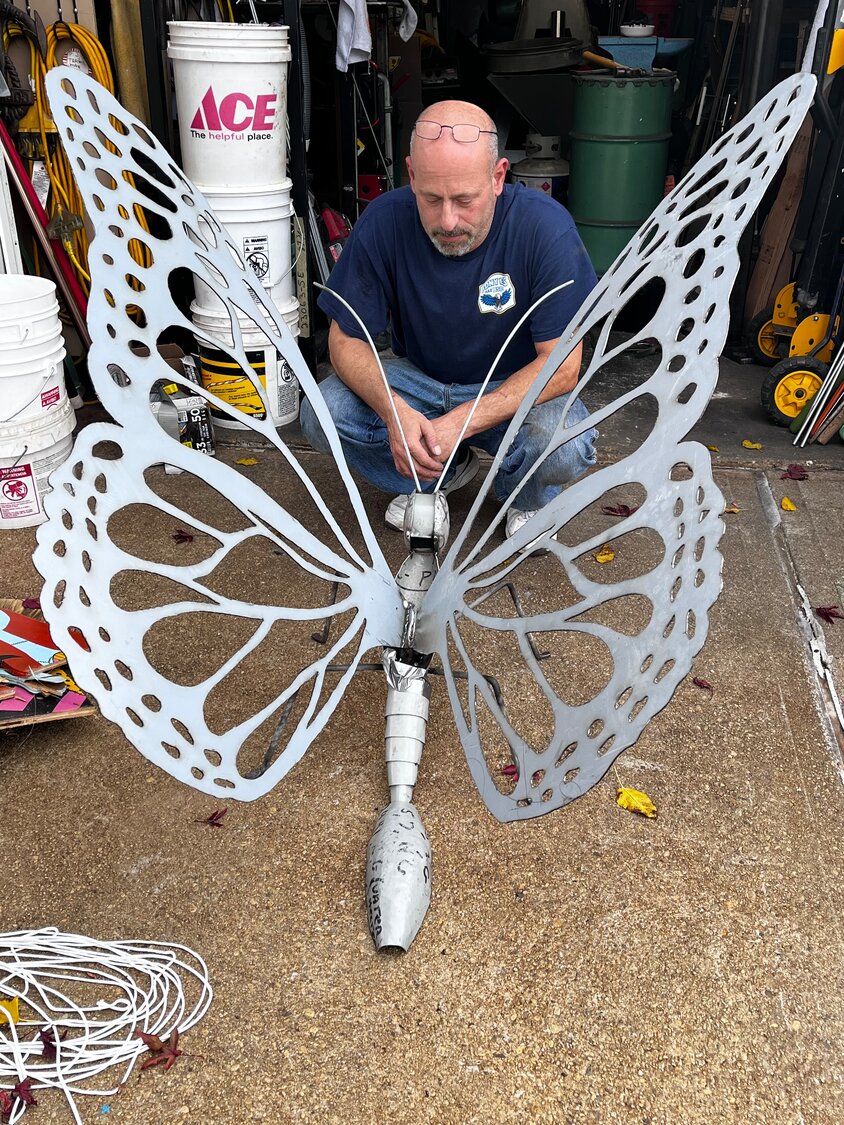 Mitchell Siegel made a large butterfly sculpture, which was donated to the Wantagh temple and made from scrap metal that he found working as an electrician.