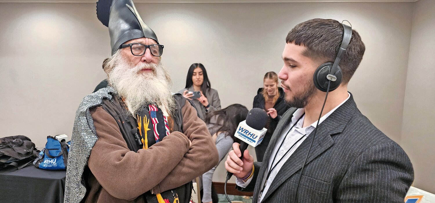 Among his many interviews, Joseph Pergola, right, interviewed performer and activist Vermin Supreme about the New Hampshire primary.