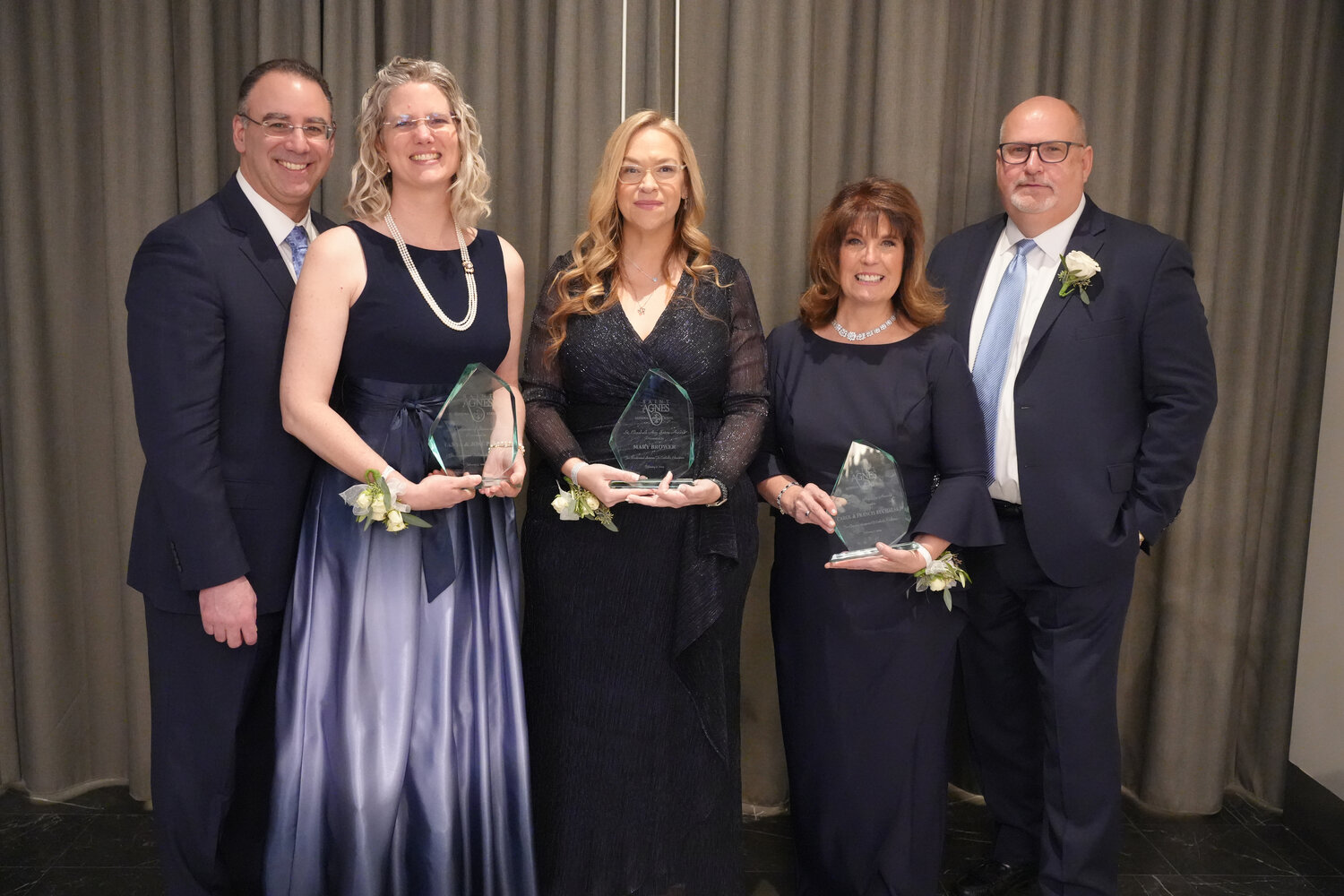 Award recipients Dr. José Prince, left, Dr. Tanya Prince, Assistant Principal Mary Brower, Carol Ruchalski and Francis Ruchalski were recognized during the 2024 St. Agnes Dinner Dance at The Grand Lannin in East Meadow.