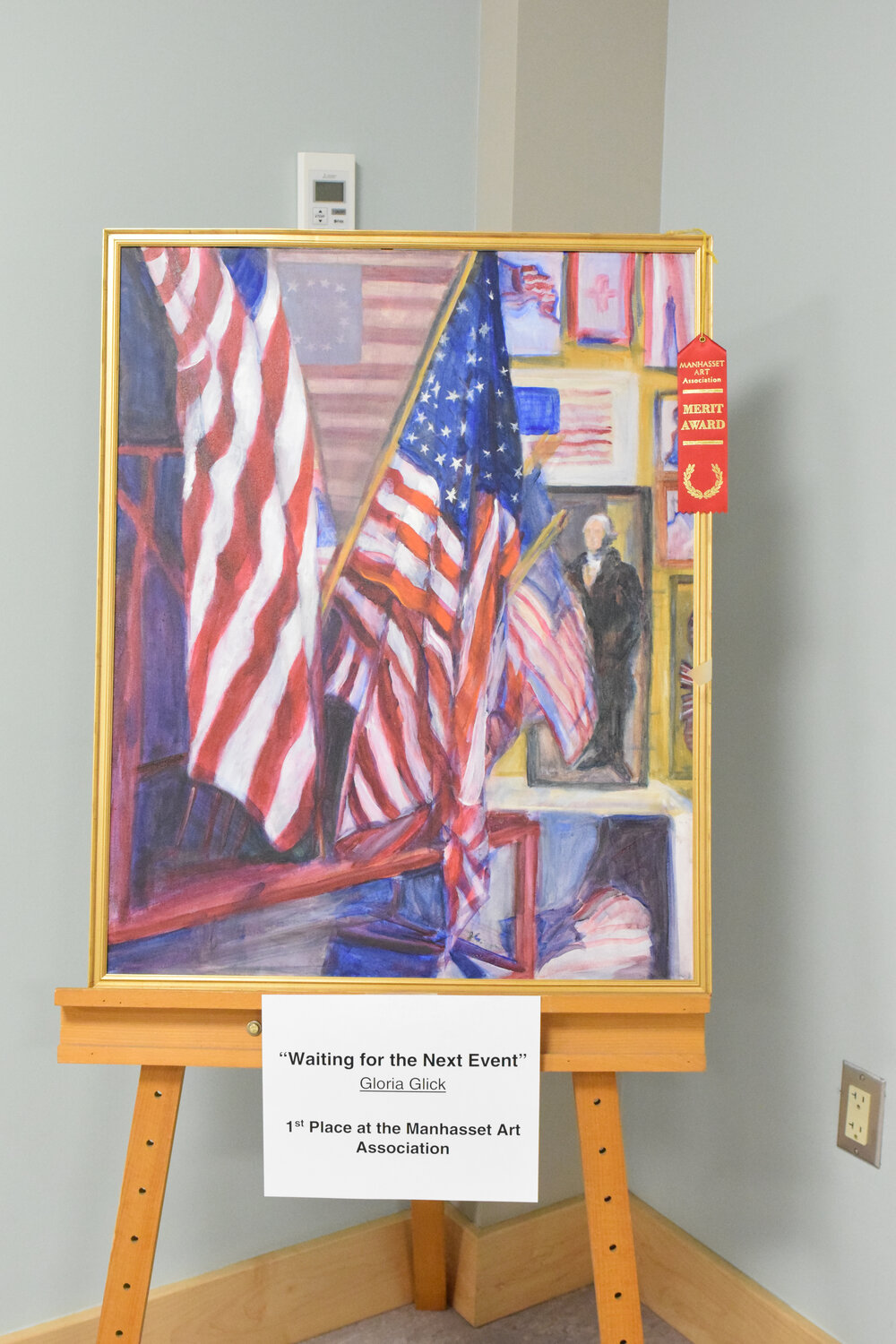 The show features the work of Gloria Glick — an accomplished artist and longtime East Meadow resident, as well as the work of her students. Above, Glick’s painting ‘Waiting for the Next Event,’ which one first place at the Manhasset Art Association.