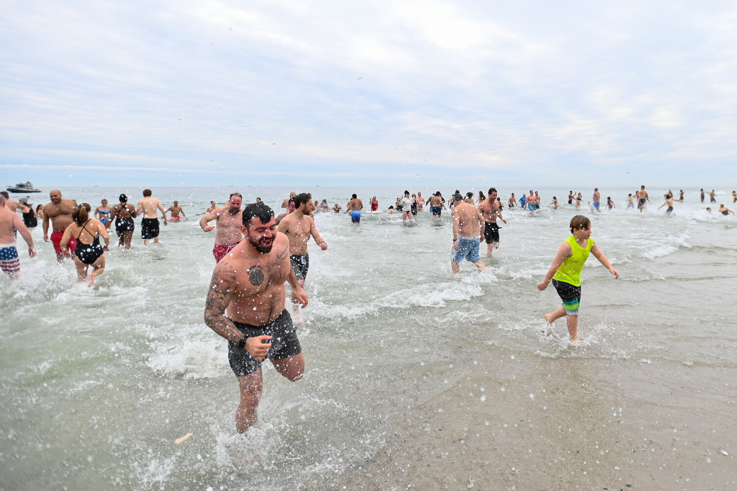 Groups of friends and family take the frigid plunge together each year.