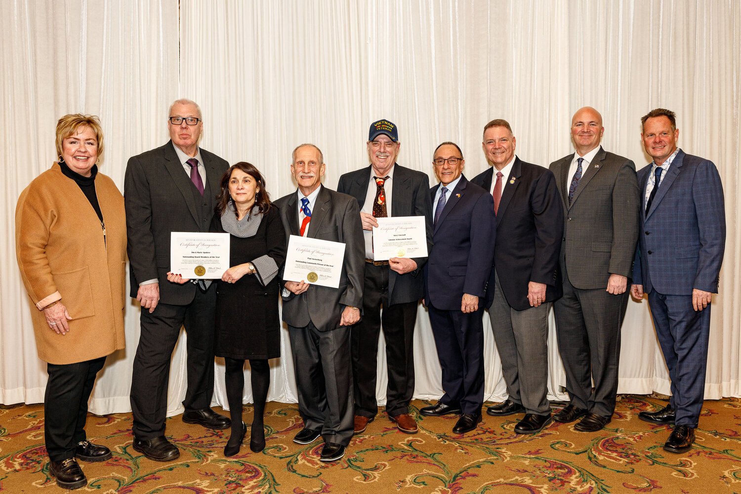 At the Chamber of Commerce of the Bellmore’s annual installation dinner, several community members were honored. Above. Hempstead Town Clerk Kate Murray; Jim and Marie Spohrer, the Chamber Members of the Year; Paul Zuckerberg, the Outstanding Community Person of the Year; Steve Chernoff, recipient of the Lifetime Achievement Award; Legislator Michael Giangregorio; State Sen. Steve Rhoads; Councilman Chris Carini and Chamber President Gene Judd.