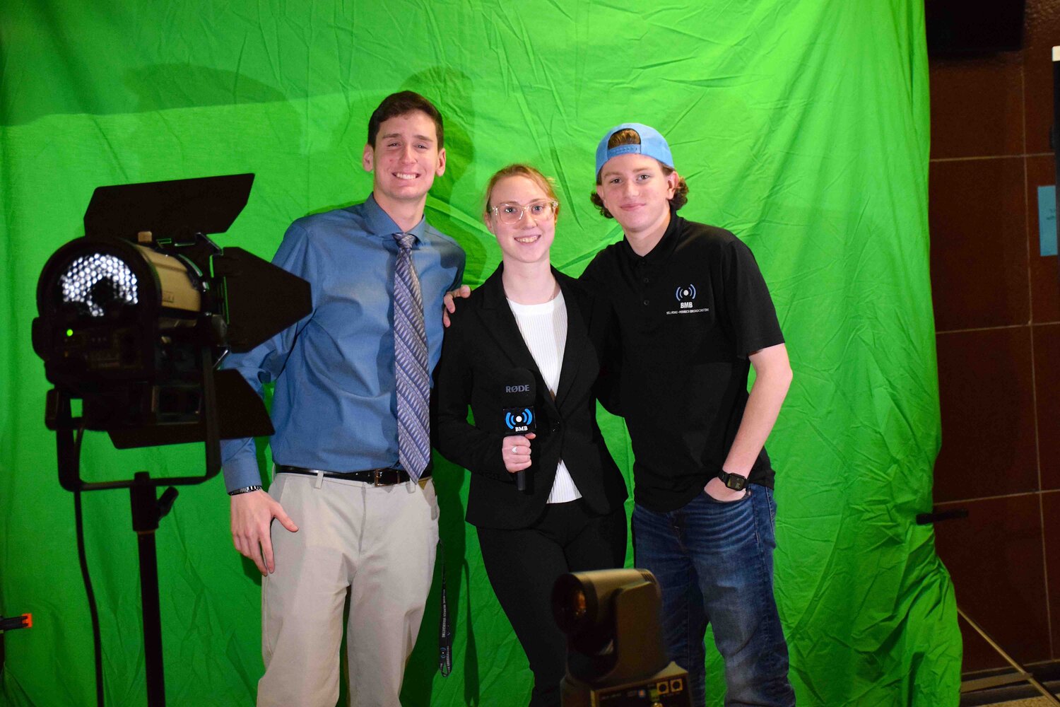 Tyler Steinberg, Brianna Boland and Ryan Marr of Bellmore-Merrick Broadcasting showed off the program’s green screen, giving visitors the chance to be weather forecasters.