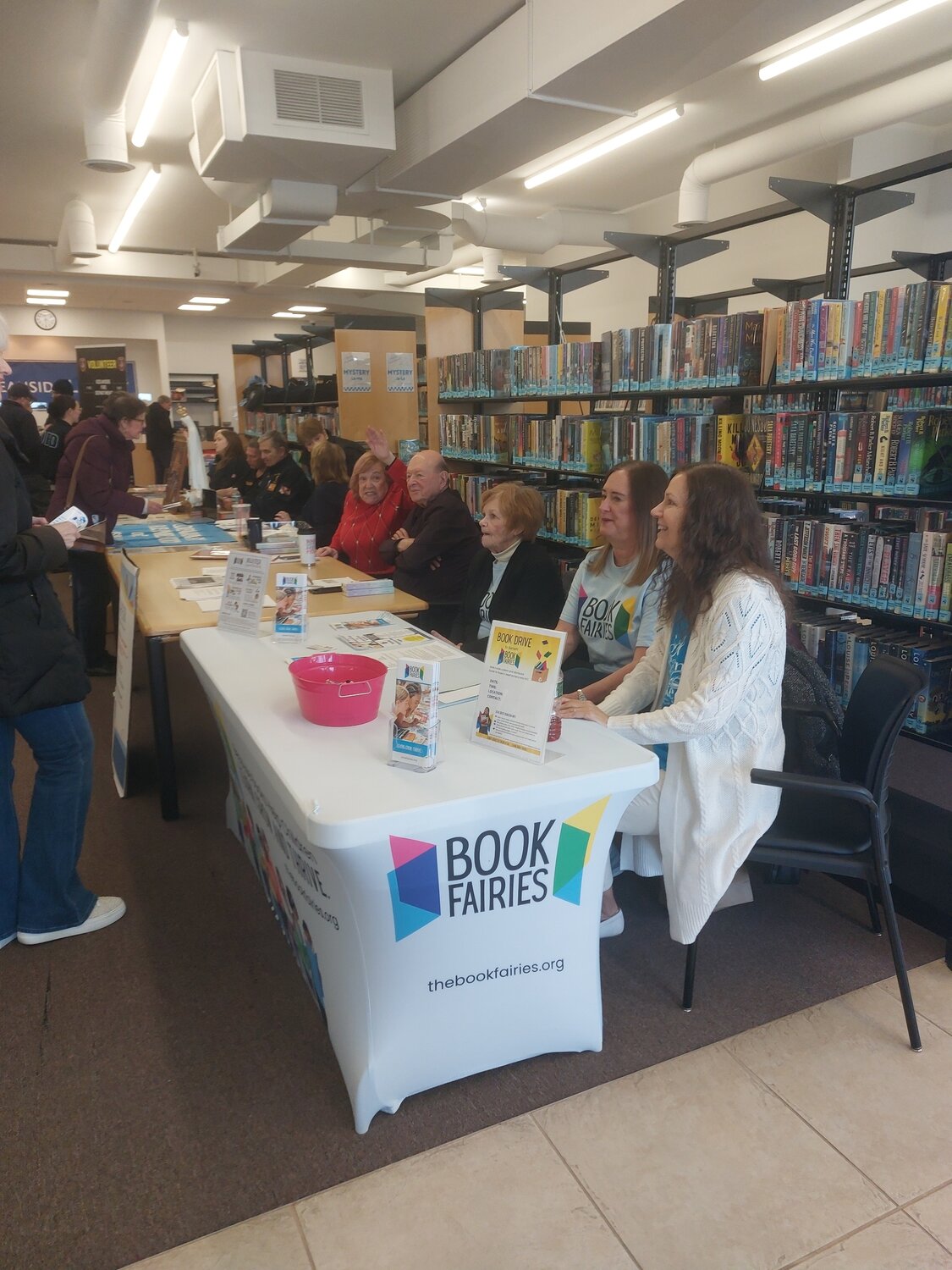 Book Fairies, a non-profit organization in Freeport which sources and redistributes books to under-resourced communities on Long Island and internationally set up a table and welcomed those interested