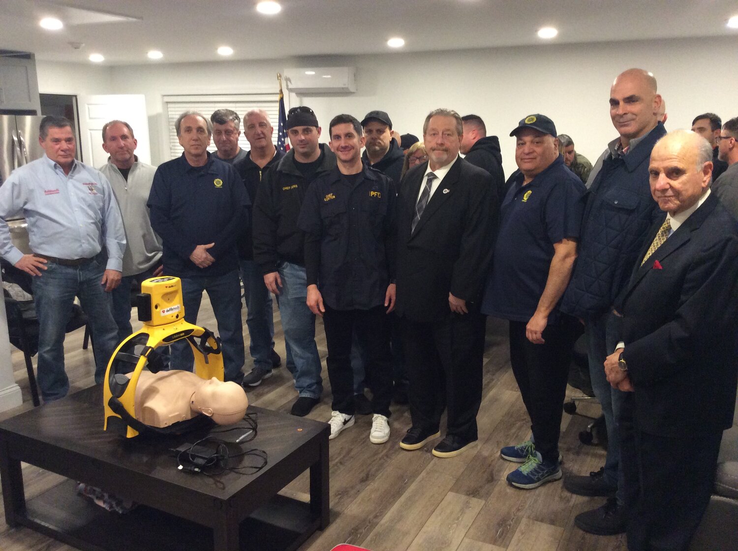 The Island Park Fire Department gathered with County Legislator Patrick Mullaney and Island Park village board members at the Barnum Island Fire District on Jan 31. for a presentation on using the new CPR equipment purchased by the fire district