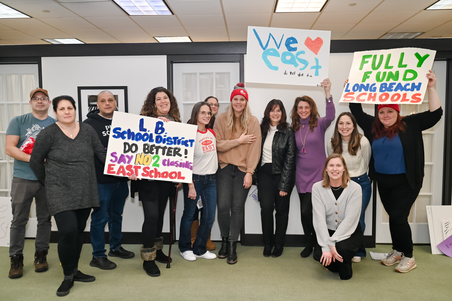 Local parents gathered at Bridgeworks on Tuesday to express their disappointment in Gov. Kathy Hochul’s proposed cuts in school aid, which could force the closure of East Elementary School.