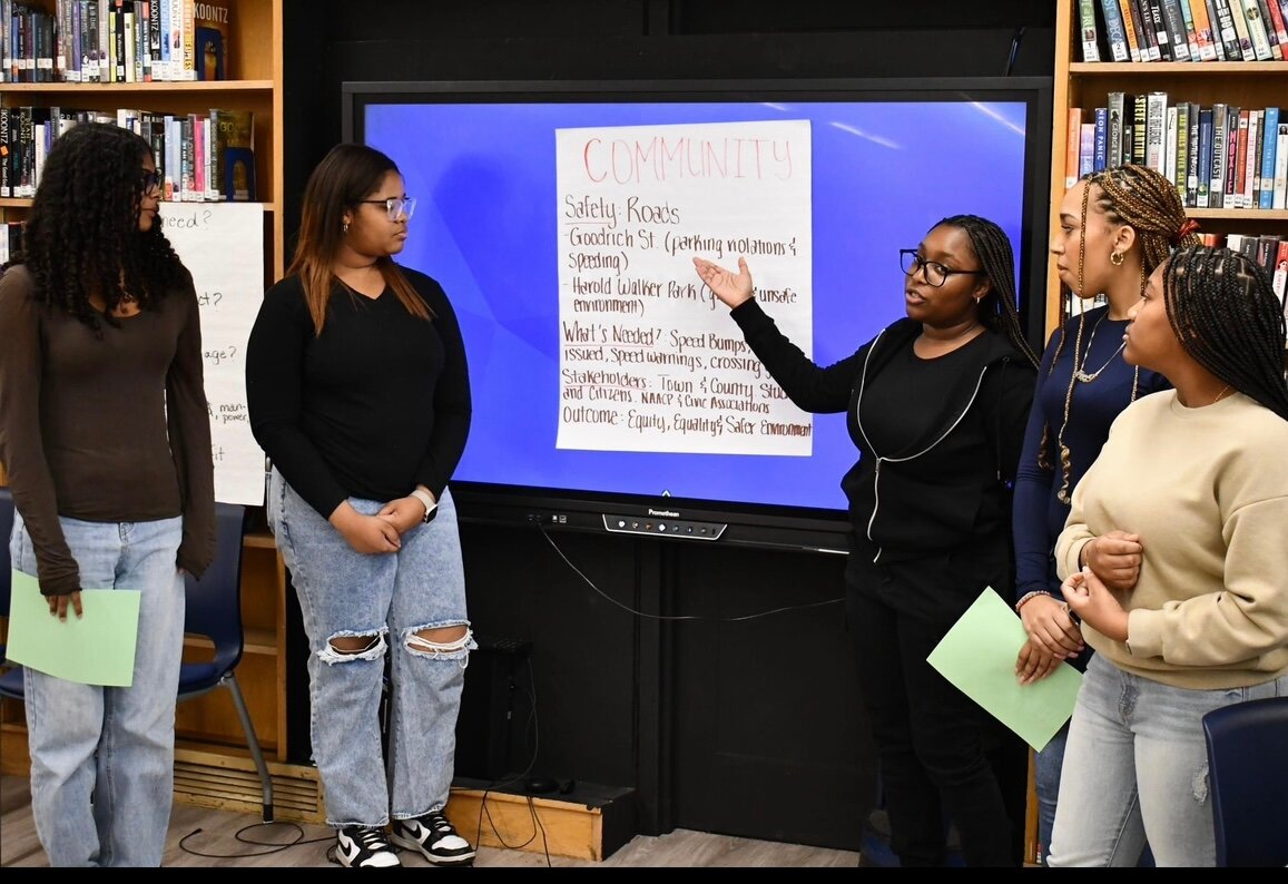 Students from Uniondale and Malverne presenting in front of their peers, Assemblywoman Taylor Darling’s representative, and Nassau County Legislator Siela Bynoe, their plan on how they would improve their communities through policy and legislation.