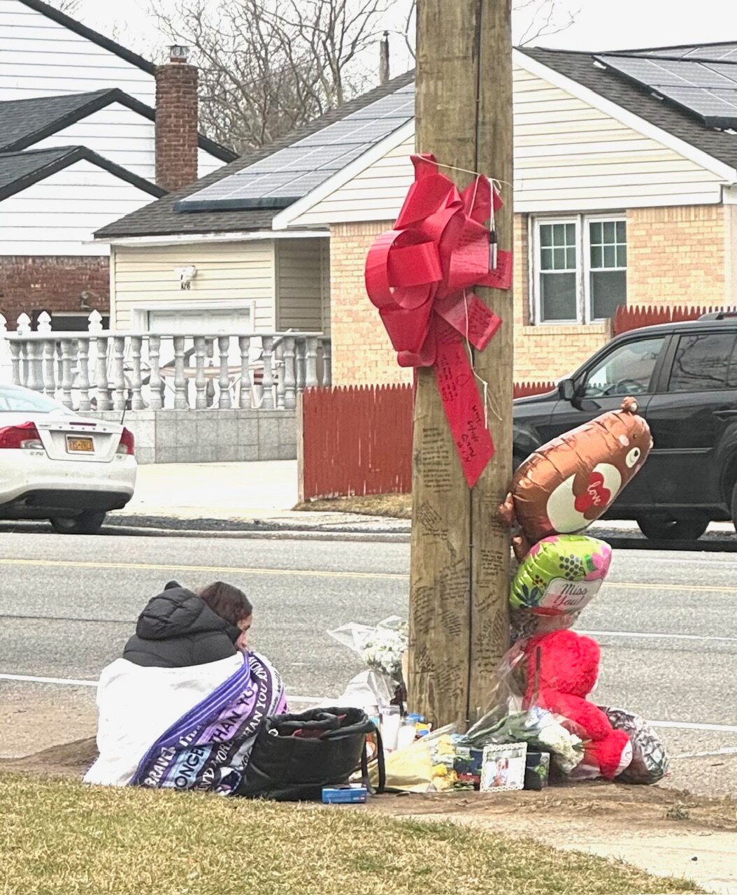 A makeshift memorial in memory of Pablo Rivera, who died in the one-car crash on Rosedale Road near Lawrence Court in North Woodmere on Feb. 10.