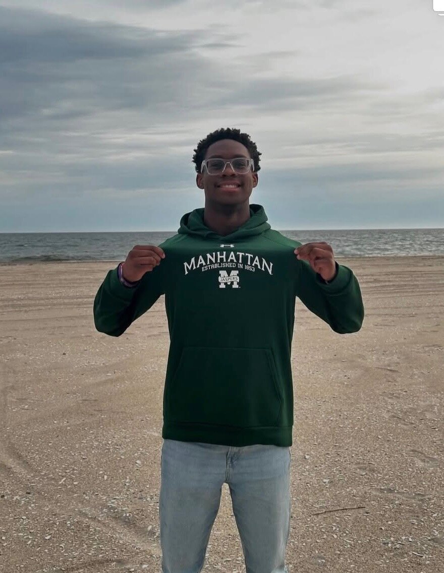 Academy Charter School senior Myles Brown is the first athlete from the school to earn a Division I athletic scholarship. He will swim for Manhattan College.