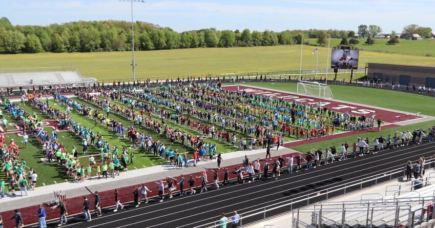 Over 2,500 students, staff and faculty at the Logan-Rogersville School District gathered in an attempt to host the largest ever game of follow-the-leader.


Contributed Photo