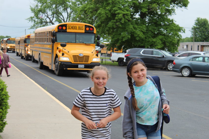 Schools out for summer! Webster Elementary students are all smiles as they hop off the bus to celebrate the last day of Marshfield schools on May 24.&nbsp;