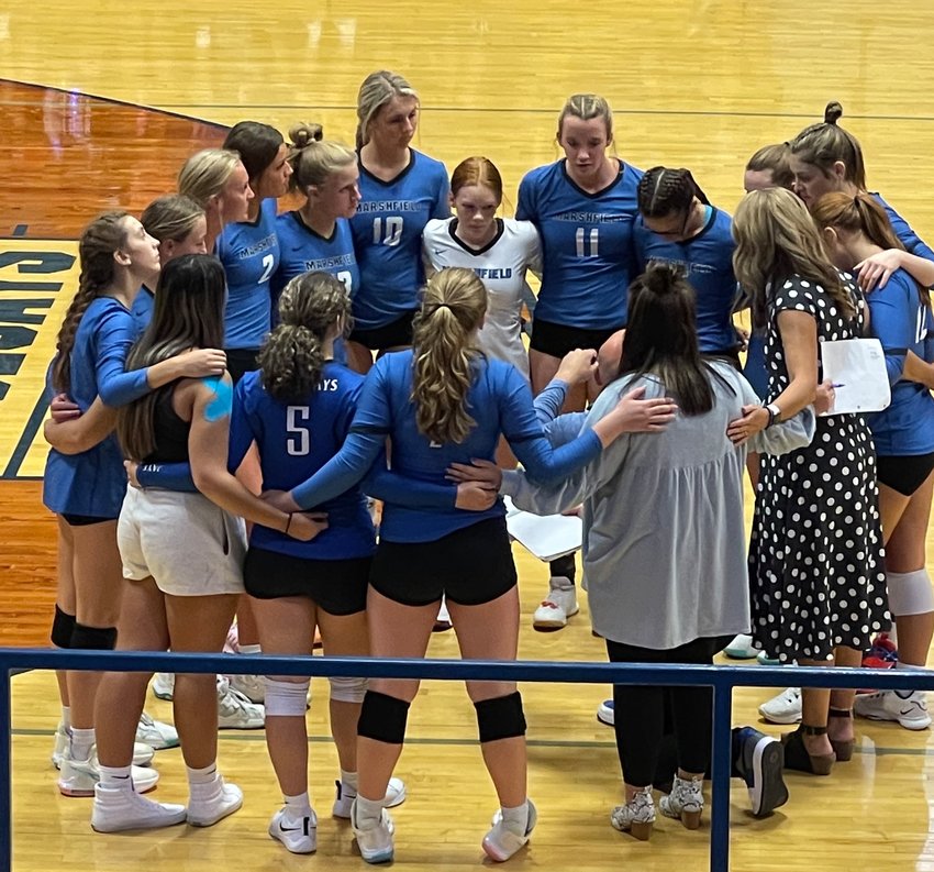 Coach Olsen pulls the girls in during a time out against Republic on Wednesday September 14. &ldquo;Right now I think we are all just looking forward to a little bit of rest and a lot of practice,&rdquo; laughed Coach Olsen after the loss.