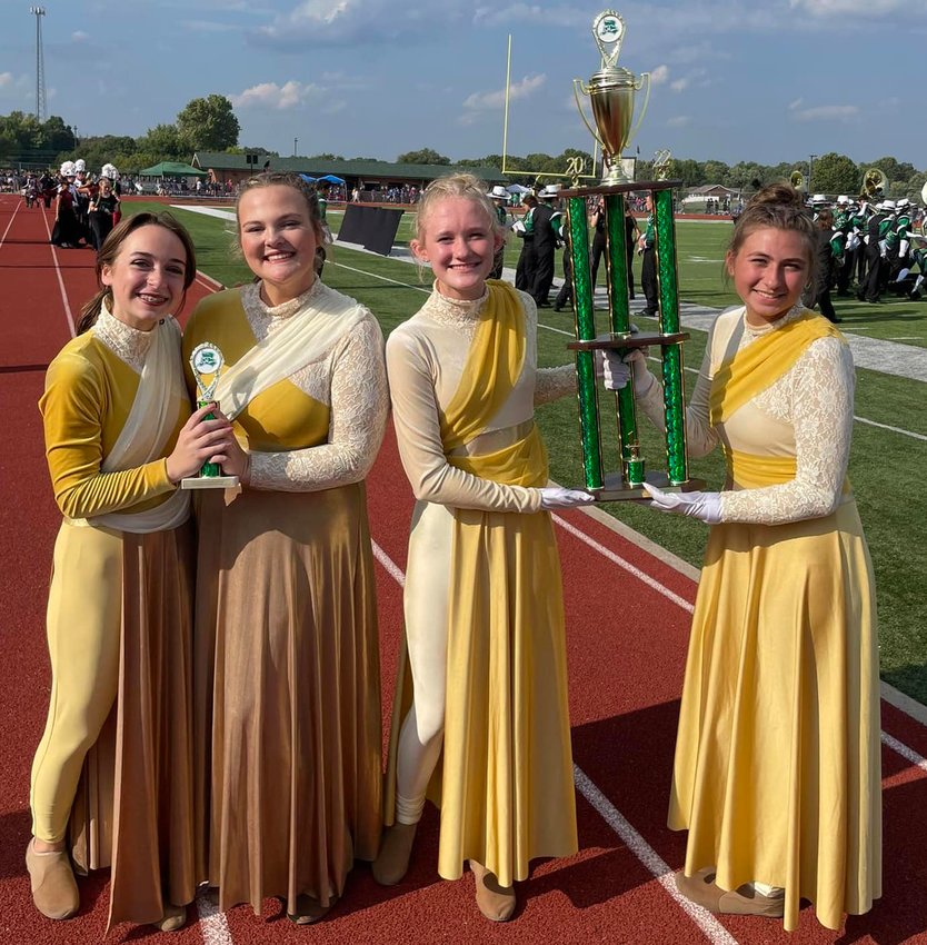 Marshfield High&rsquo;s Color Guard and Drum Majors celebrate after winning 1st in  Auxillary and 2nd overall at the Mt. Vernon competition.