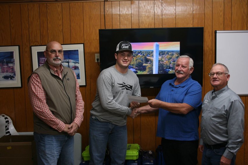 Presenting the $100 prize for winning the competition were the Webster County Commissioners. Pictured left to right: Northern Commissioner Dale Fraker, Hunter Cantrell, Presiding Commissioner Paul Ipock, and Southern Commissioner Randy Owens.