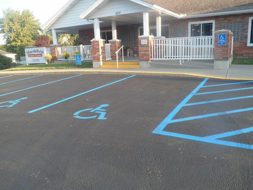 Coltrane Asphalt recently resealed and striped the parking lot at the Senior Center, thanks to a grant from Webster Electric Foundation.   Contributed Photos