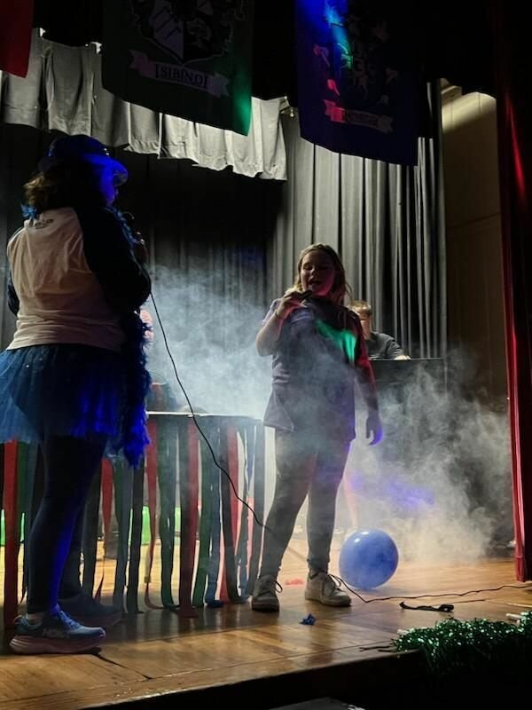 Students were assigned to their &quot;houses&quot; during an afternoon assembly inthe gymnasium on Friday, Oct. 6.&nbsp;Angelia Koch's Event Planning Class took on the challenge of planning the event, which the school dubbed as a success.&nbsp;