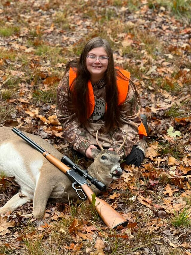 Madi Burney with her first deer harvested during early youth season this weekend. The deer was taken with&nbsp;her father, late Sgt. Justin Burney&rsquo;s, 30-30 on the land he used to hunt.   Contributed Photo