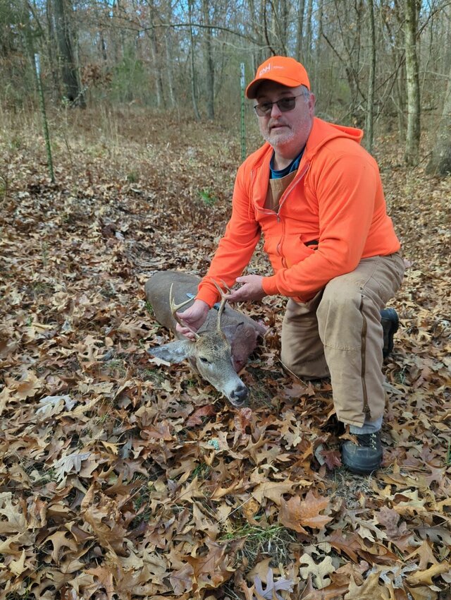 Clay Burney with a six point buck harvested on the Burney's land in Webster County.   Contributed photos