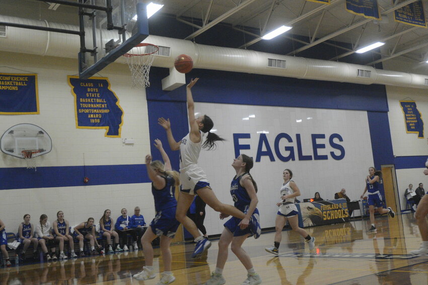 Sophomore Loren Bojko wins the tips for Fordland's Lady Eagles in their first-round matchup with the Bradleyville Lady Eagles. 


Mail photos by Ryder Berger 