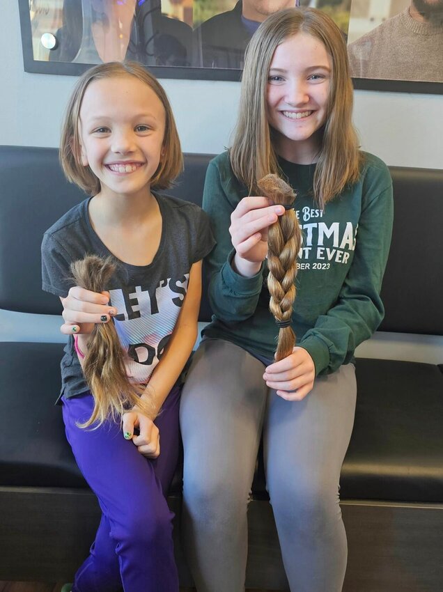Nadia (left) and Adalynn (right) Rowe recently donated their hair to make wigs for patients with medical hair loss.&nbsp;   Contributed Photo