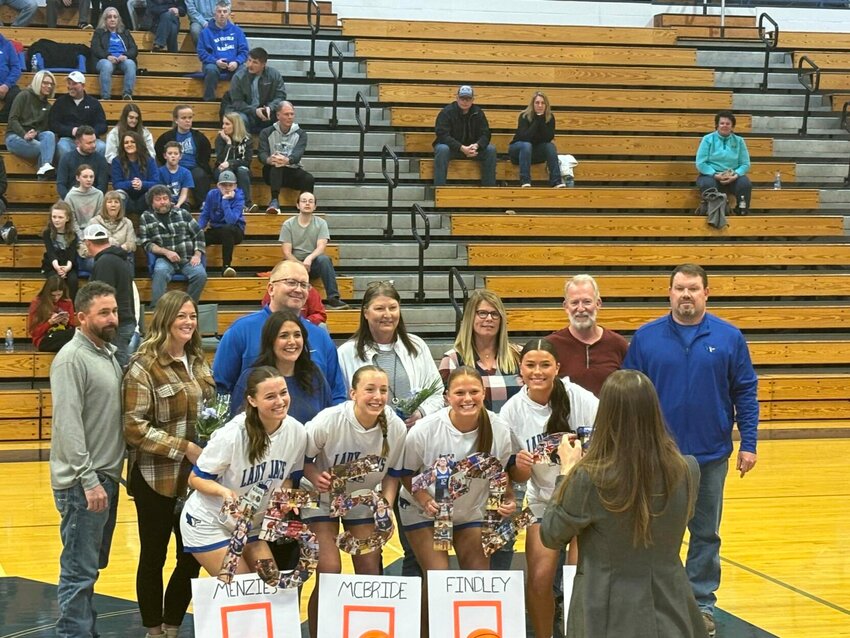 Marshfield Lady Jays celebrated senior night ahead of the Big 8 Championship game Monday night. Pictured left to right with their parents are: Halle Minzies, Abigail McBride, Lillie Findley, Lauren Luebbert. 


Contributed Photos