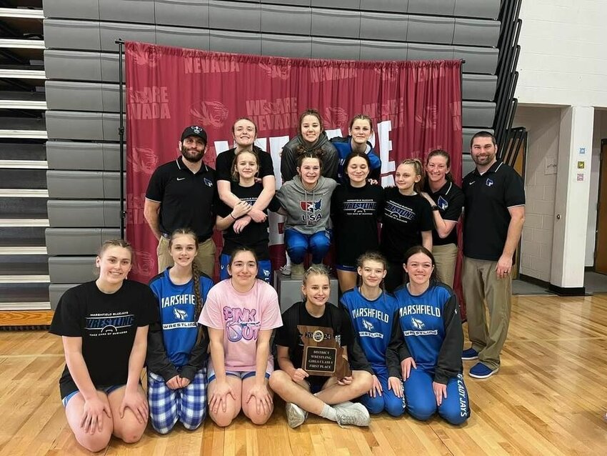 Pictured is the Marshfield girls wrestling team following their weekend win at Districts. 


Contributed Photos