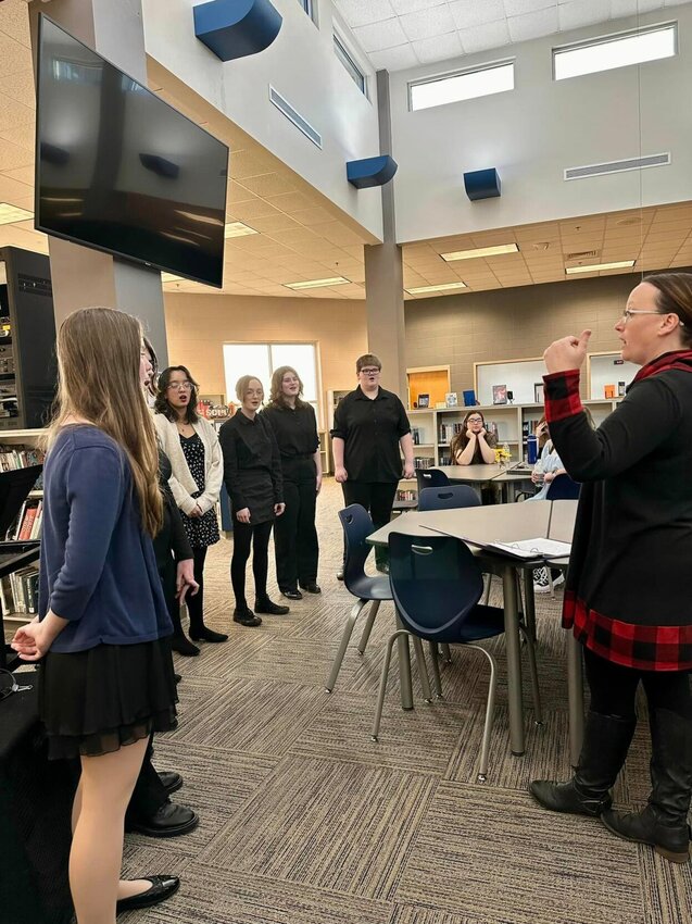 Dr. Howes from Southwest Baptist University speaks to Marshfield Choir students as their guest clinician at the pre-contest performance.


Contributed Photo