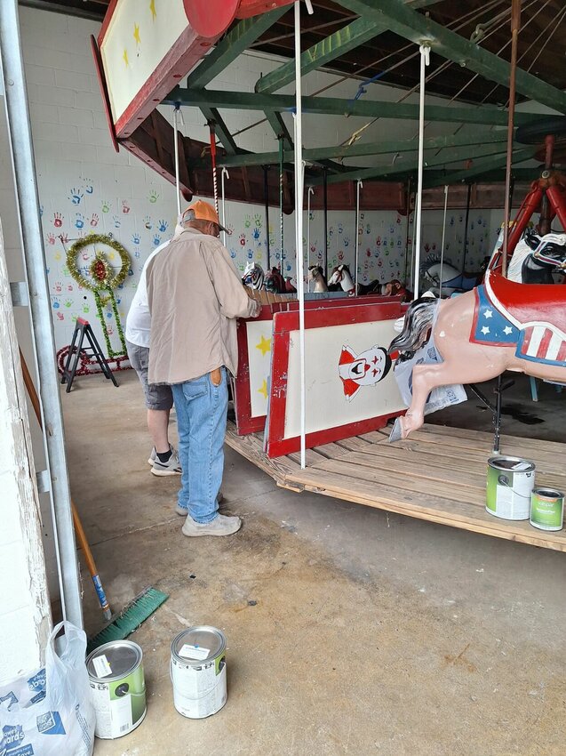 For what's believed to be the second time in several decades, the Community Days carousel is being painted.&nbsp;   Contributed Photos