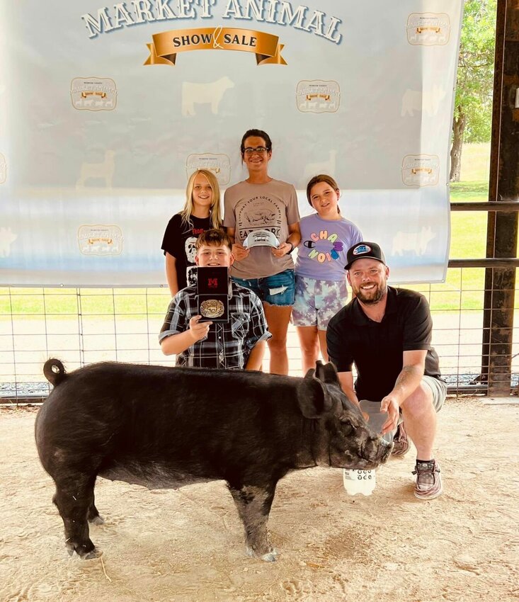 Bennett Vestal's Champion Market Hog commanded an astonishing $5,100 at the Webster County Market Animal Show and Sale Saturday, June 29.
