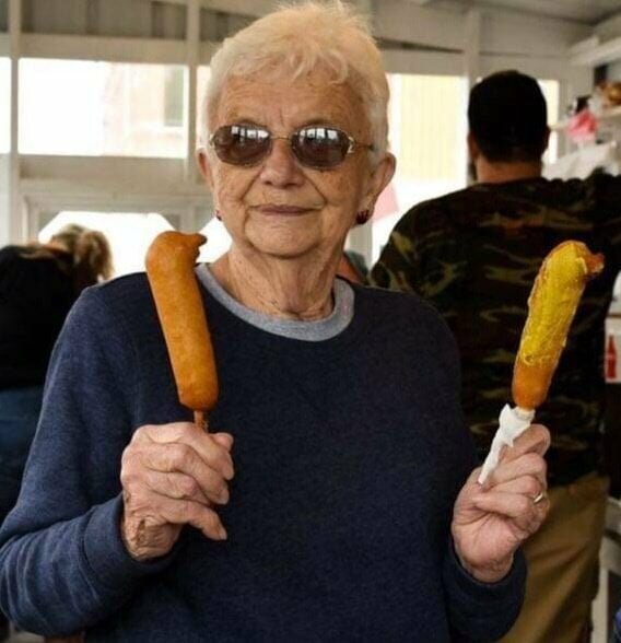 Beverly Barlow pictured inside the famous Apple Festival corndog booth, which she has maintained seamlessly over the years.   Contributed Photo