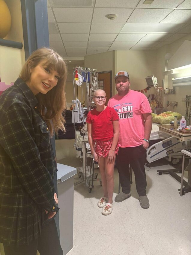 Taylor Swift (left), Matney Crawford (center) and Brandon Crawford are pictured at Children's Mercy Hospital in Kansas City.   Contributed Photo
