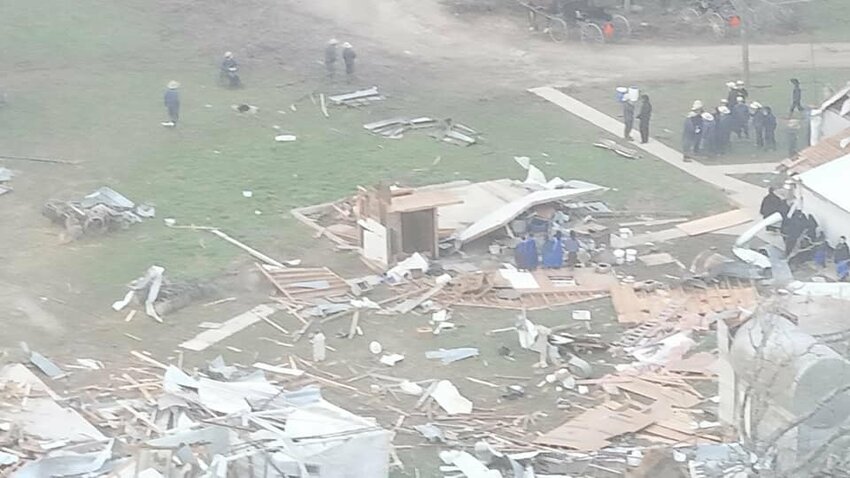 Pictured in the center is the outhouse which was all that was left standing after Friday's tornado. Three amish girls survived the storm, as they were inside the outhouse as the tornado passed through, destroying everything else on the property. 


Photo by James Curl