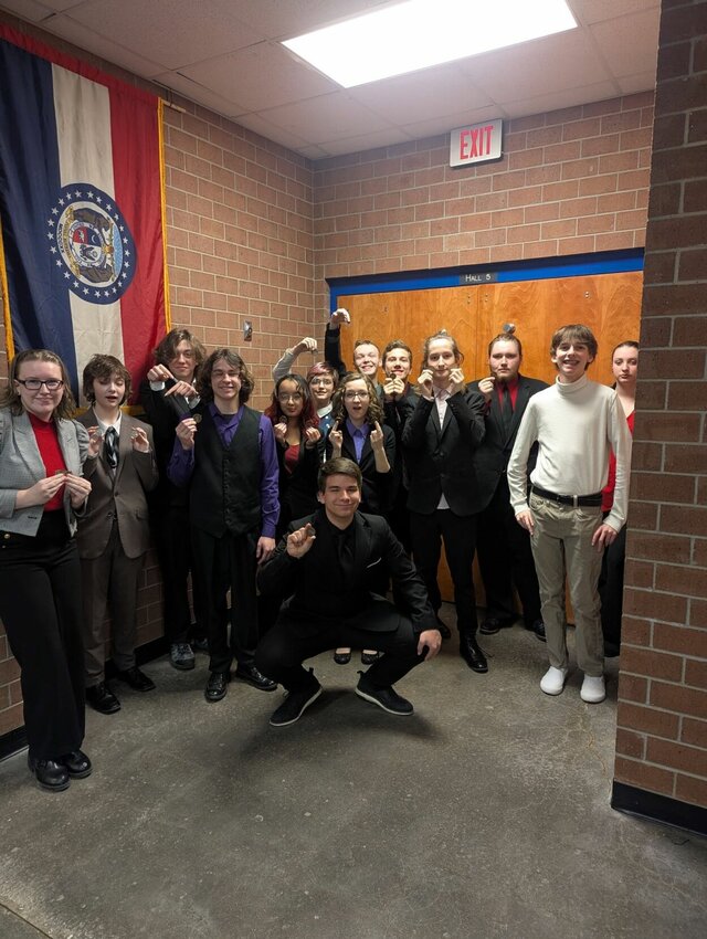 Marshfield's Speech and Debate teams pose with their winnings at&nbsp;MSHSAA Districts over the weekend.&nbsp;In speech, Marshfield had 14 entries in finals, 5 entries qualifying to STATE, and placed 3rd in speech sweepstakes.&nbsp;In debate, Marshfield had 4 entries in quarterfinals.   Contributed Photo