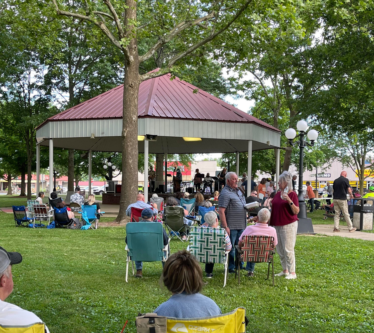 Folks from all over the county carried in lawn chairs and ate their meals from their laps while visiting with friends and listening to the band perform.
