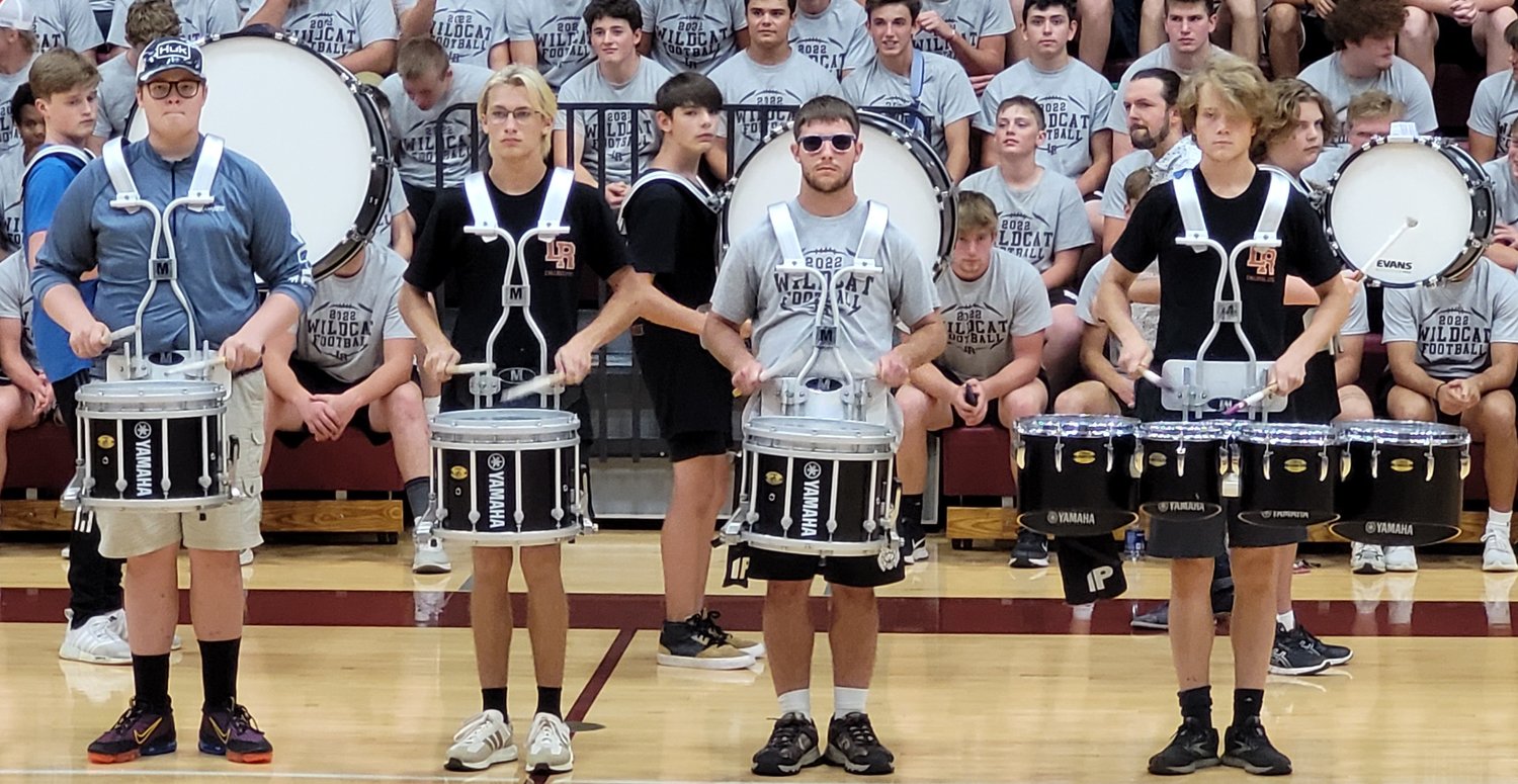 Starting and ending things with a bang are the percussion members of the L-R marching band.