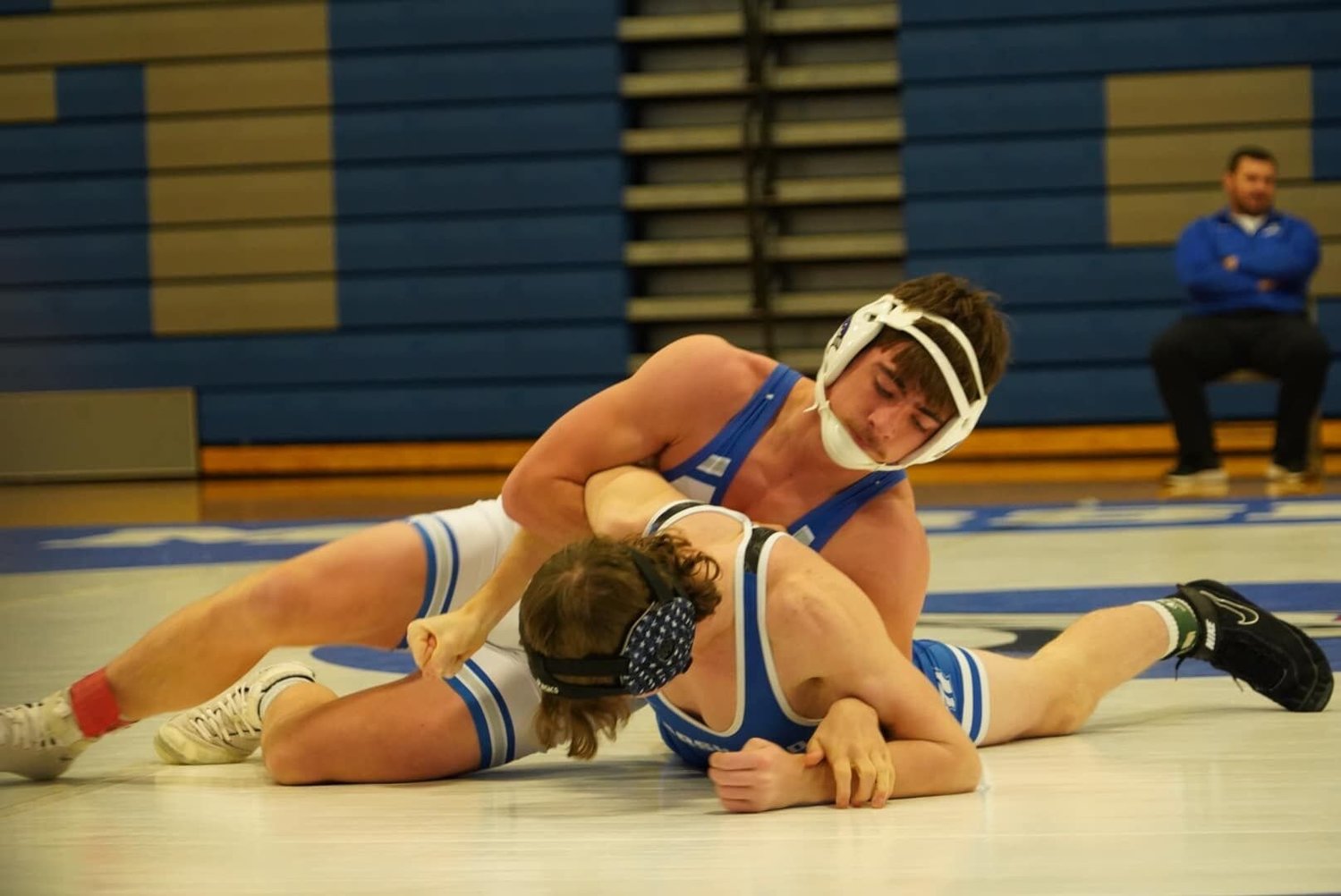 “We feel pretty good going into our first competitions next week,” expressed boys wrestling head coach Matt Holt. “Our leaders have really stepped up and we have had a great first two weeks of practice. We are really excited to put our talents on display.” In white: Junior M.J. Gritts. In blue: Junior Keelan Stewart. Members of the community can watch the boy wrestle in West Plains 12/1 and Bolivar on 12/3.