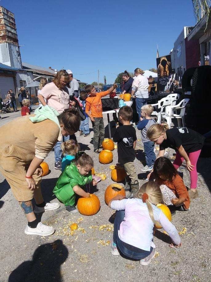 Carving Jack-o’-lanterns make for a spooktacular afternoon in Nianagua!