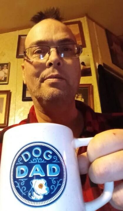 Author Robert Paul, seen here always starts his day with a good cup of coffee before settling into his writing.


Contributed Photo by Patty Williamson.