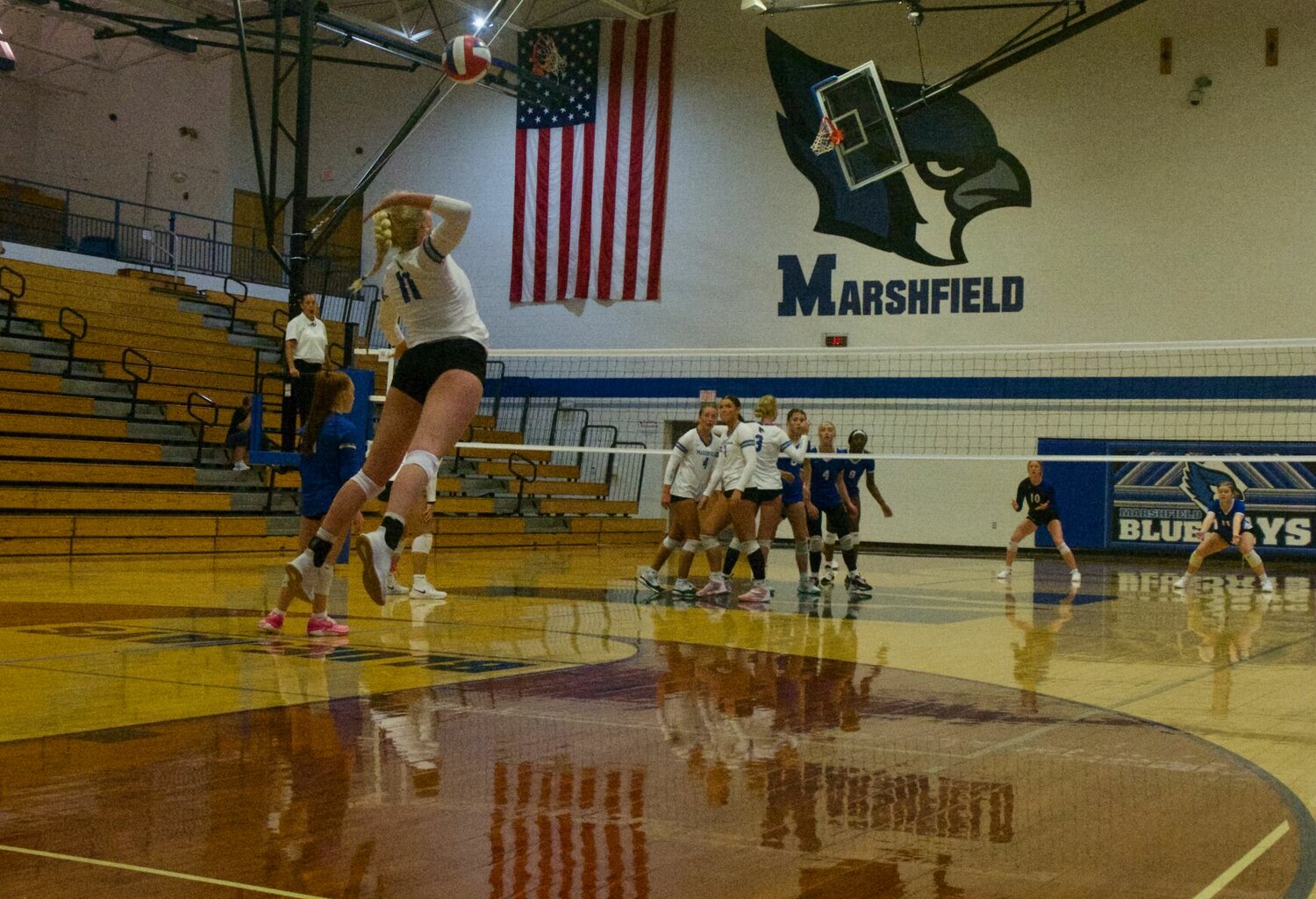 Mollie Thomas delivers a strong serve during Marshfield's match against Capital City on Saturday, Aug. 26.


Mail photo by Ryder Berger 