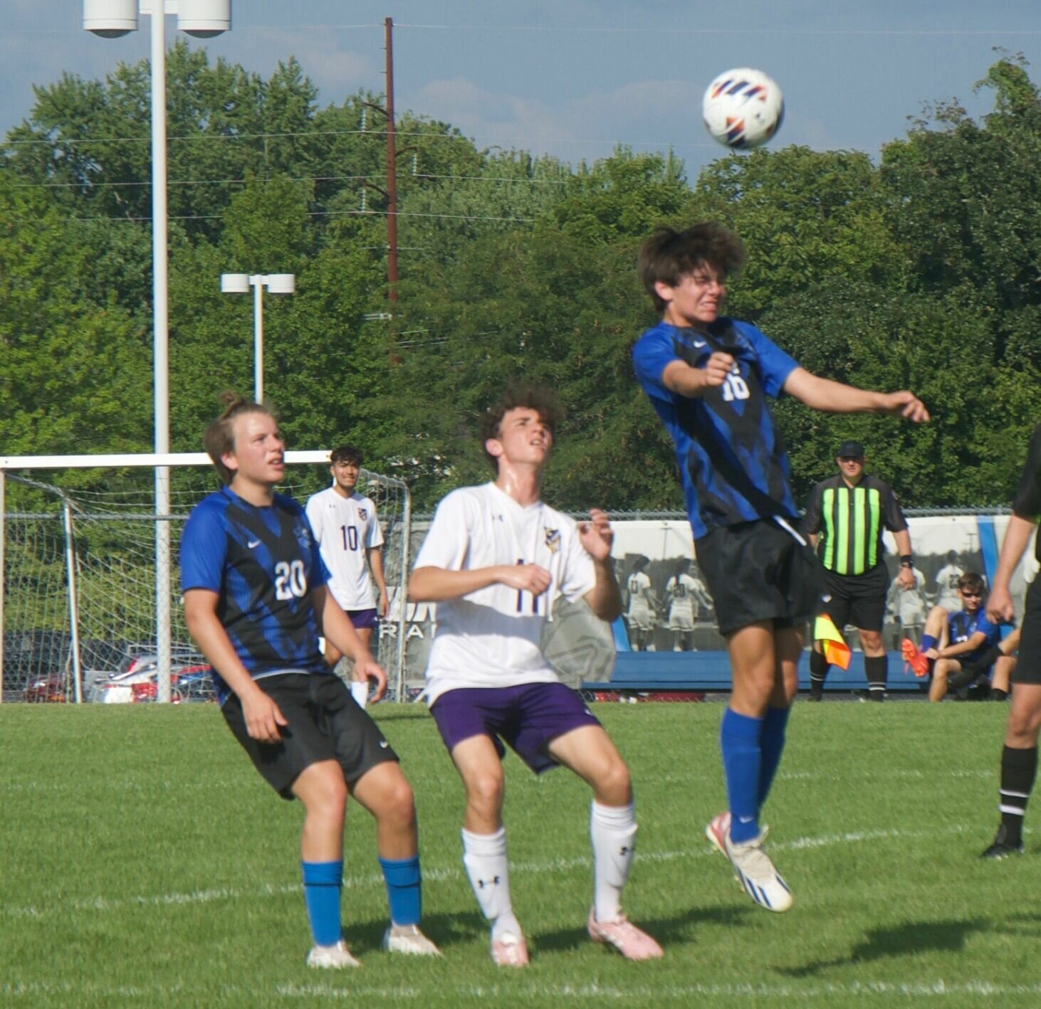 Riley Daily takes a header at midfield. 


Mail photo by Ryder Berger