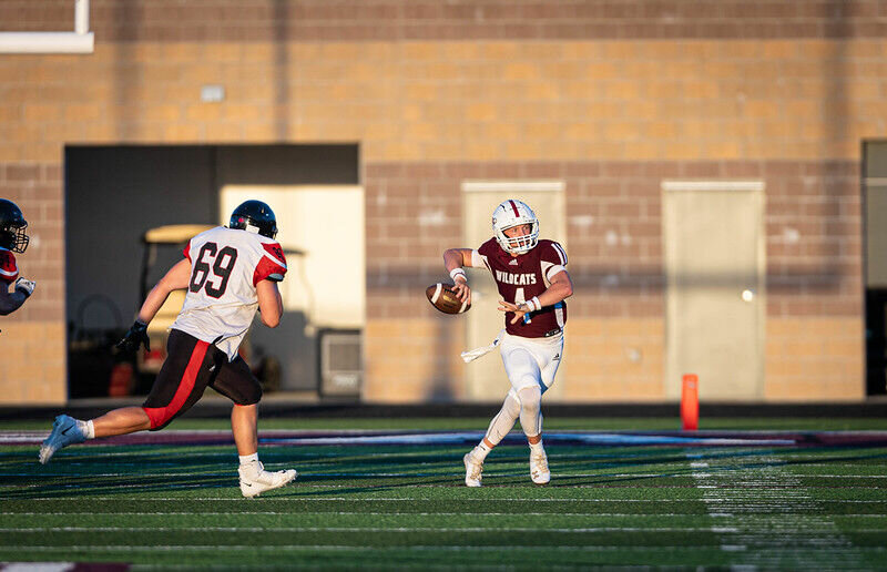 Thessen Prenger, QB, winds up for a throw. 


Contributed photo by Greenbox Photography
