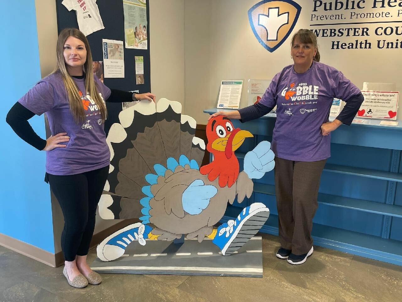Employees at the Webster County Heath Unit display new shirts that will be given to the first 150 paid registrations on the day of the Gobble Wobble.


Contributed Photo