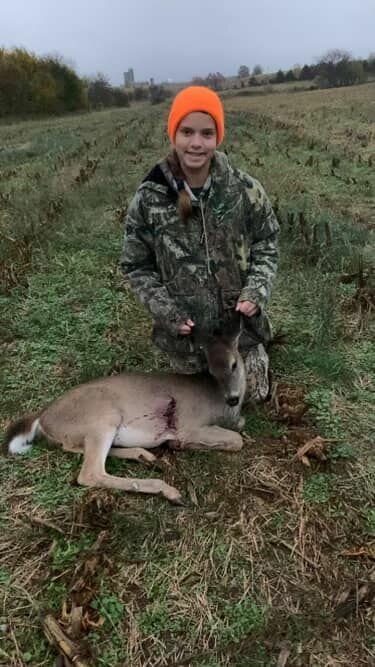 Ryleigh Jo, age 12, with her first ever harvest in Webster County.