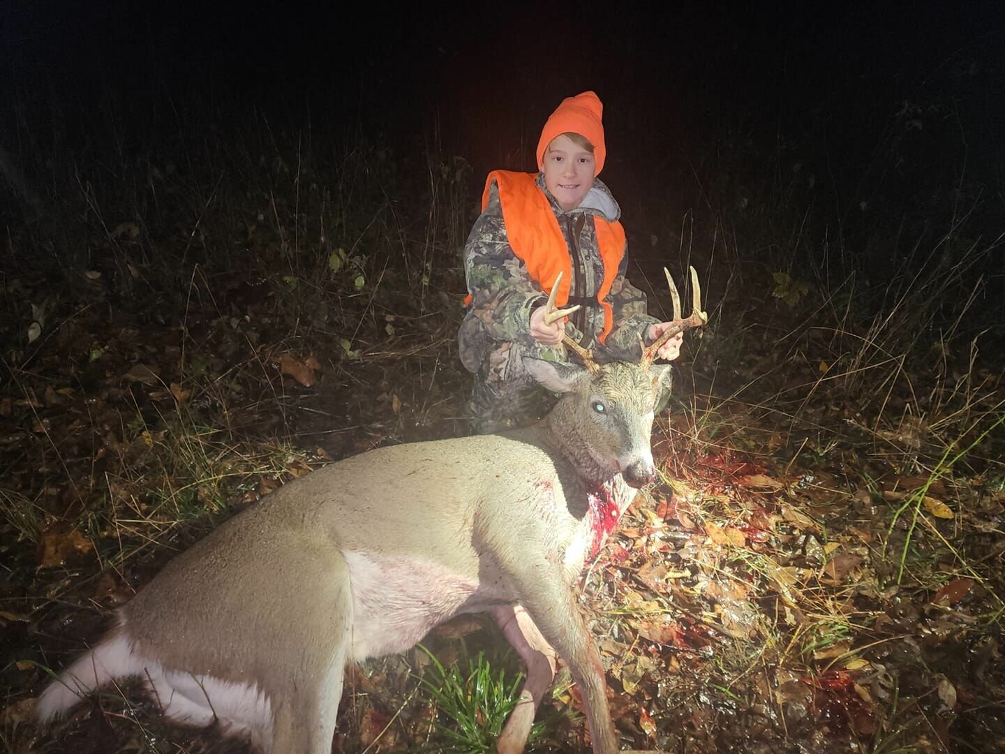 Archer Hoefer, 13, with his 7 point buck.