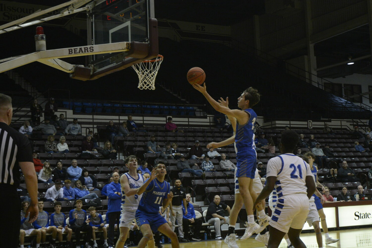 Senior Jackson Gardner with a finger roll finish at the rim against the Clever Bluejays on Thursday, Dec. 28